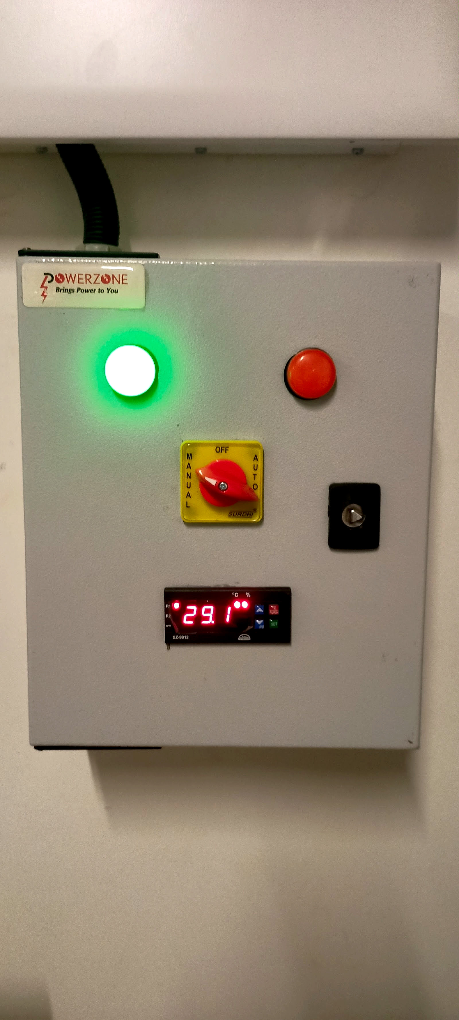 A PowerZone panel running, with the green lamp lit and the digital readout live